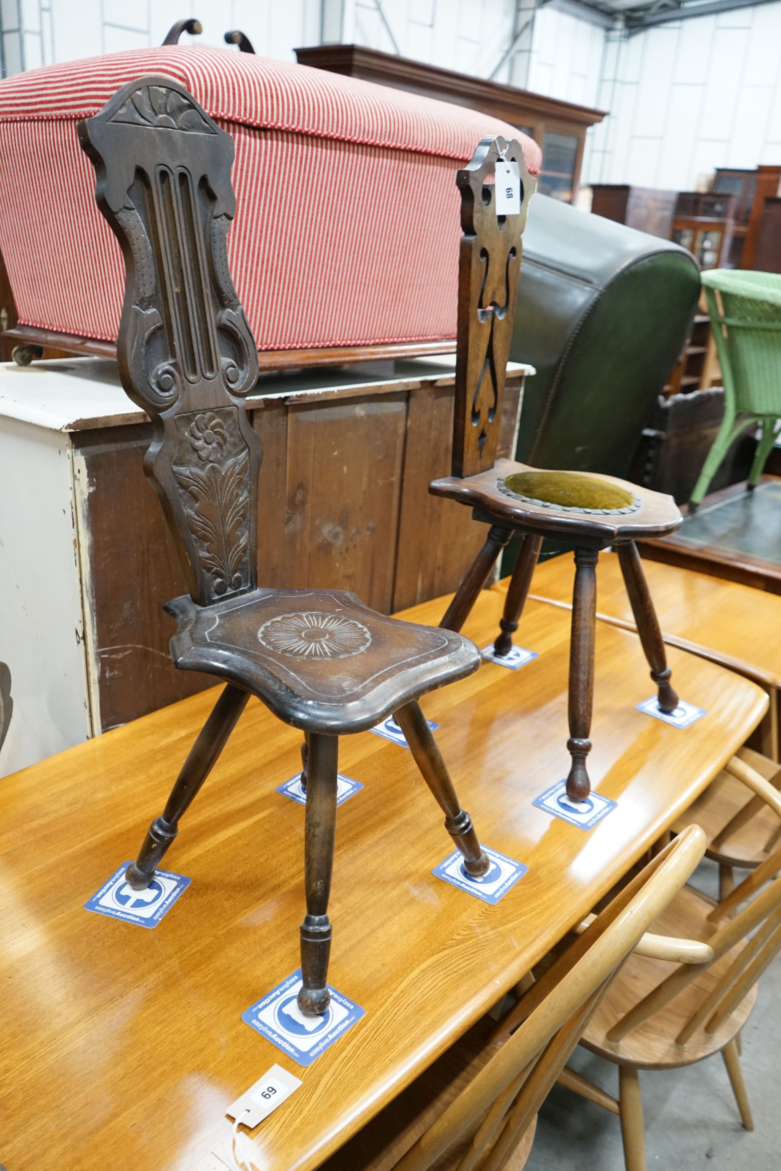 Two carved oak and beech spinning chairs